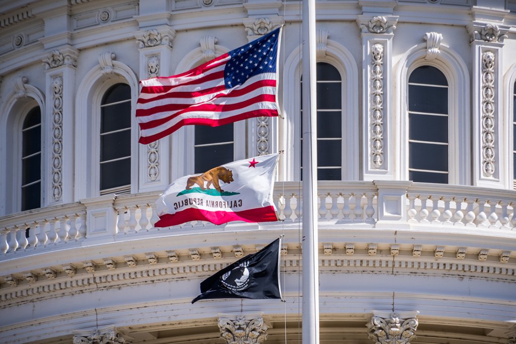 Sacramento Capitol dome and California state flag