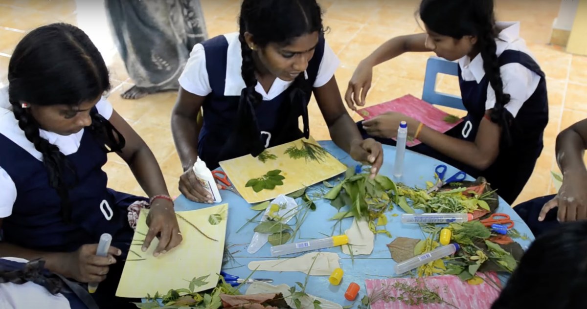 photo of Sri Lankan students working on their collages