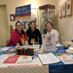 photo of LIz DiFiore with New England chapter members at a Guild booth